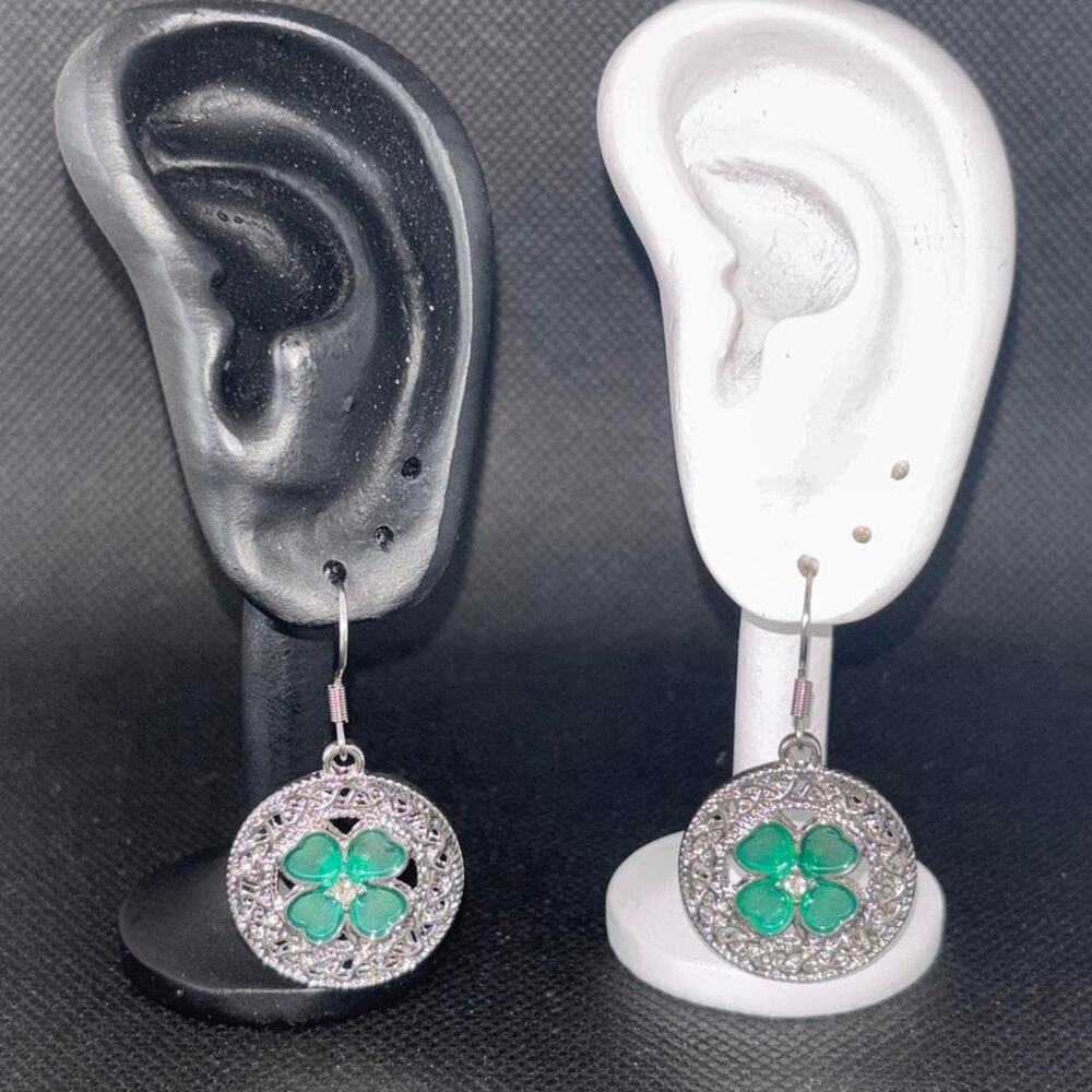 Silver earrings with green four leaf